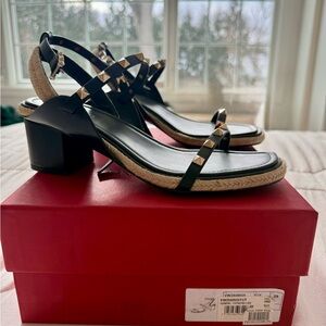 Size 39 Valentino Garavani Black Heels with Gold Studs. $200